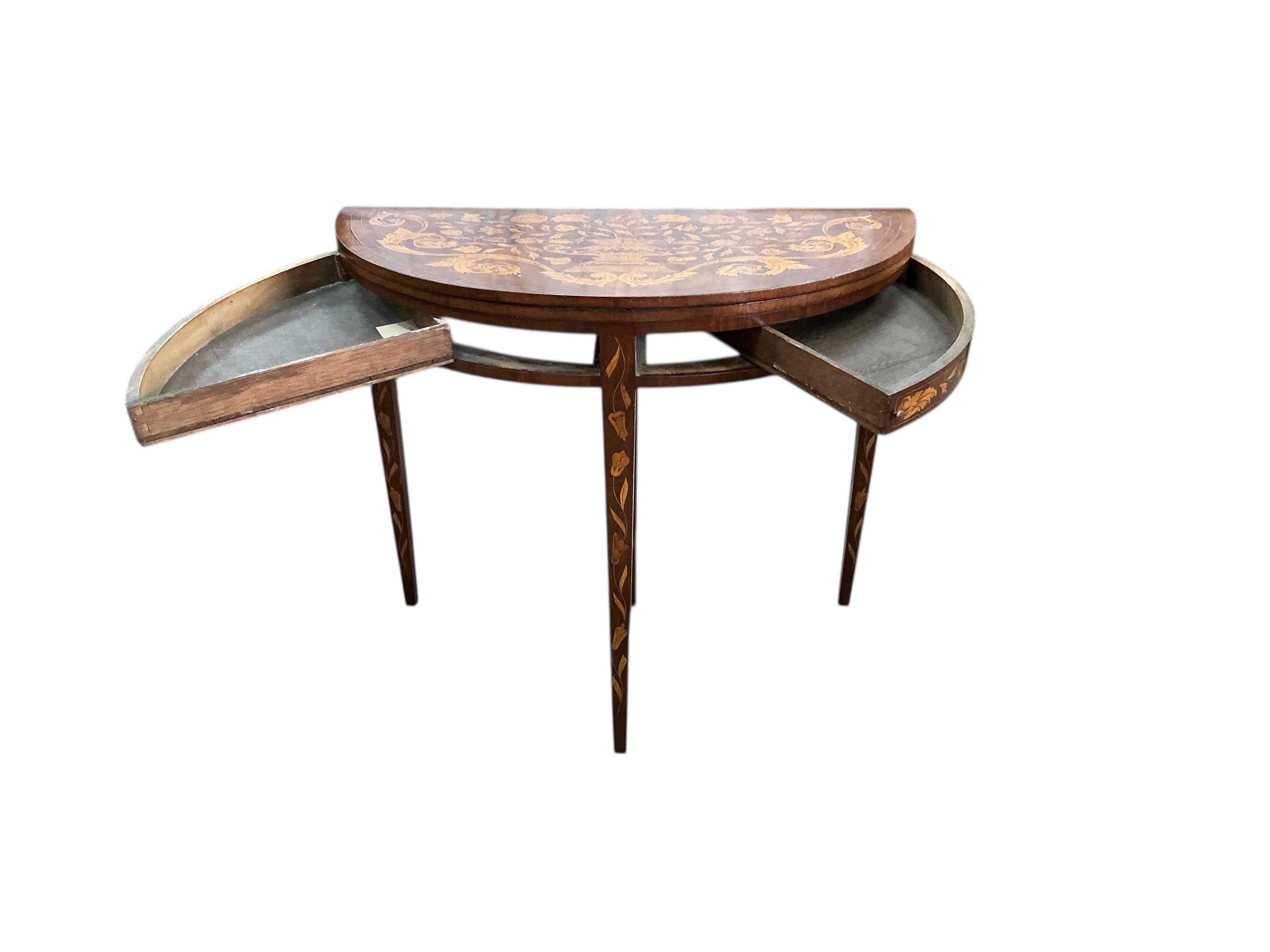 An early 19th century Dutch walnut floral marquetry folding card table, width 88cm, depth 44cm, height 76cm